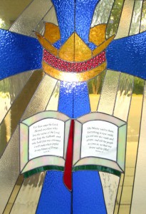 Cross and crown,with open bible.